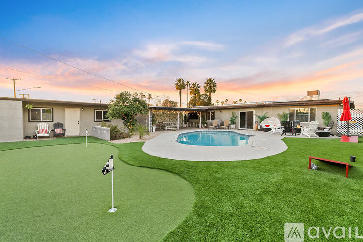 A house with a pool in the backyard.