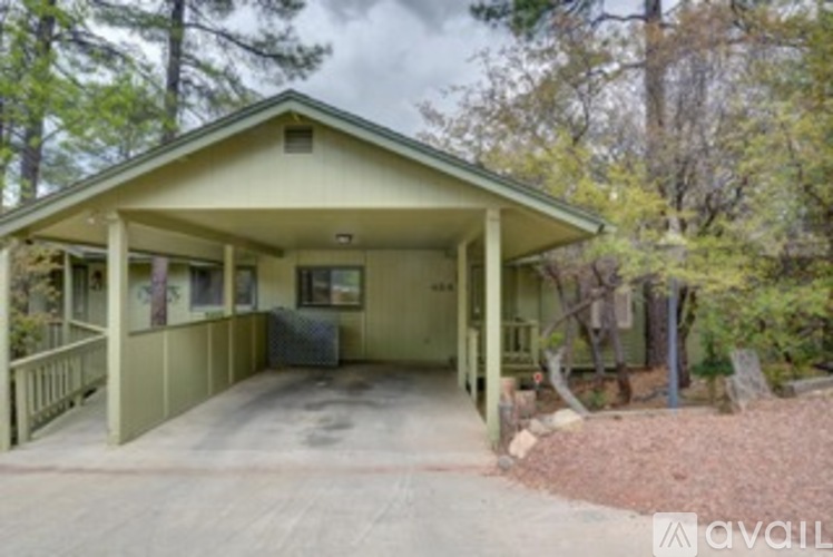 A house with a porch and a covered entrance.
