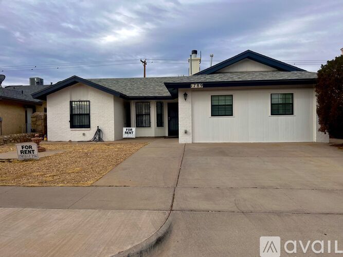A house with a garage is for rent.