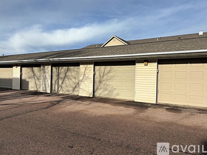 A row of garage doors are closed.