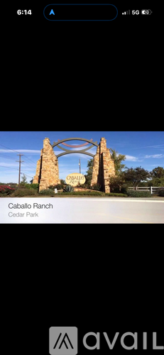 A stone archway with the text "Caballo Ranch Cedar Park" displayed below it.