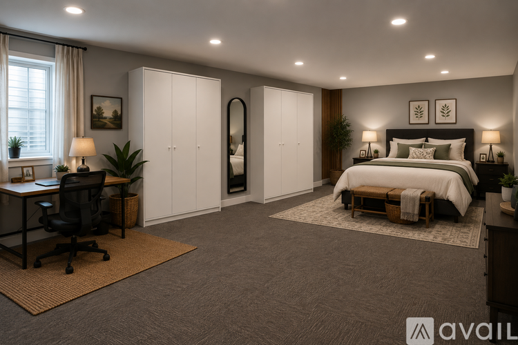 A well-lit bedroom with a bed, desk, and wardrobe.