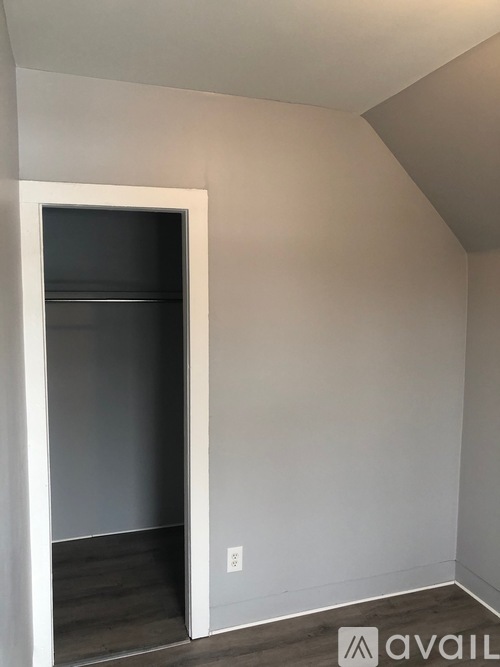 A room with a door and a window.