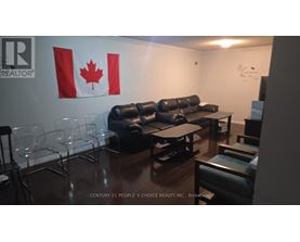 A conference room with a Canadian flag on the wall.