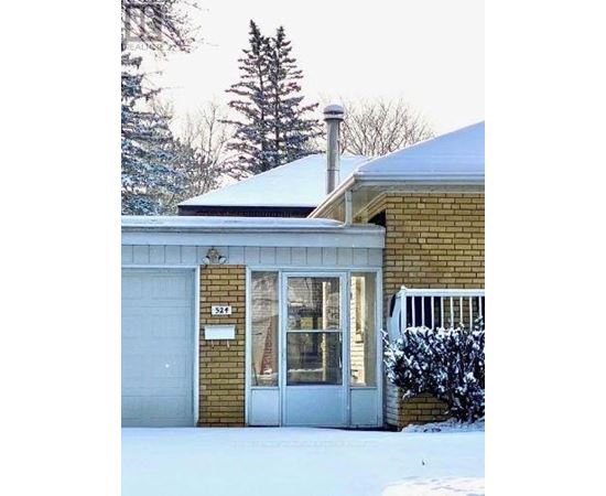 A house with the number 524 on the front door.
