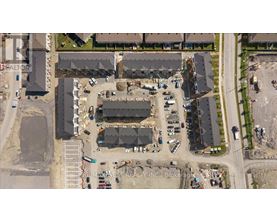 An aerial view of a construction site with a large building under construction.