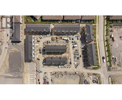 An aerial view of a construction site with a large building under construction.