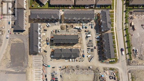 An aerial view of a construction site with a large building under construction.
