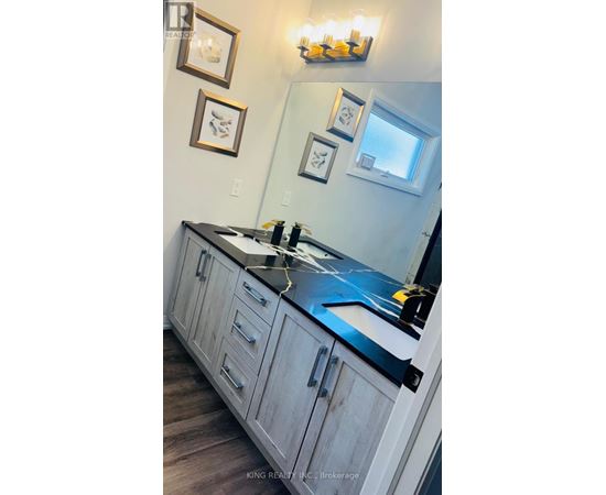 A kitchen with a counter top and cabinets.