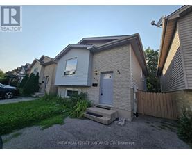 A house with a grey front and a white door is for sale in Brokerage.