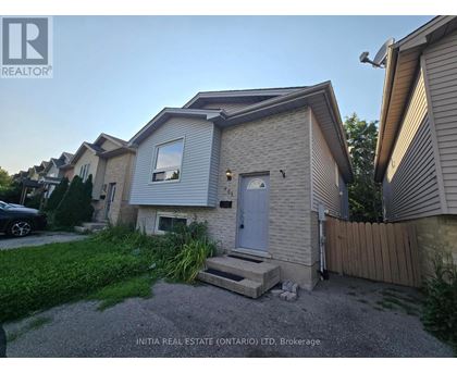 A house with a grey front and a white door is for sale in Brokerage.