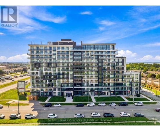 A large, modern building with a glass facade is the main focus of the image.