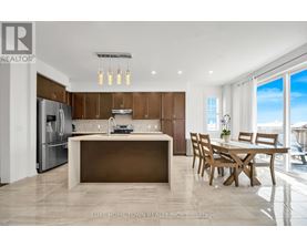 A modern kitchen with wooden cabinets and a large island.