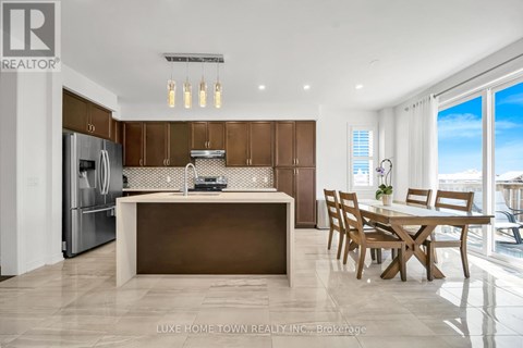 A modern kitchen with wooden cabinets and a large island.