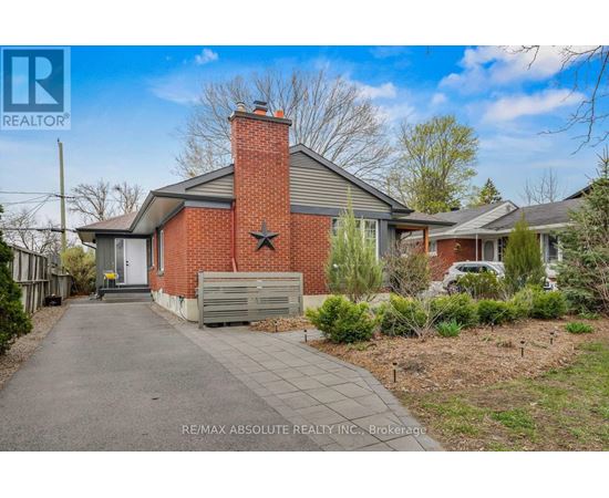 A house with a red brick chimney is for sale.
