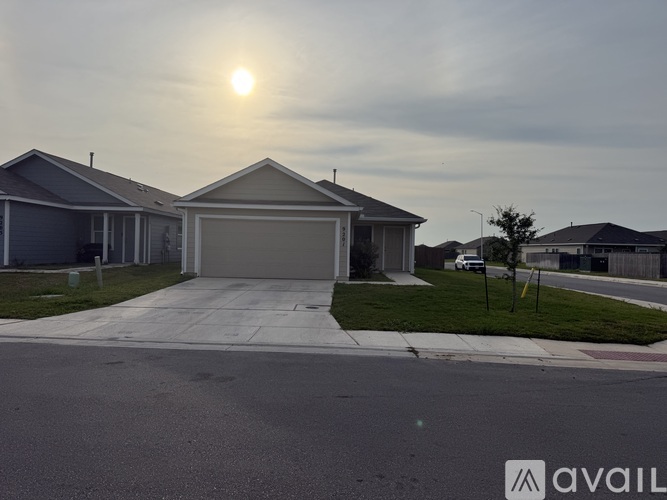 A house with a driveway in front of it.