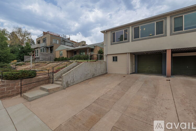A house with a driveway in front of it.