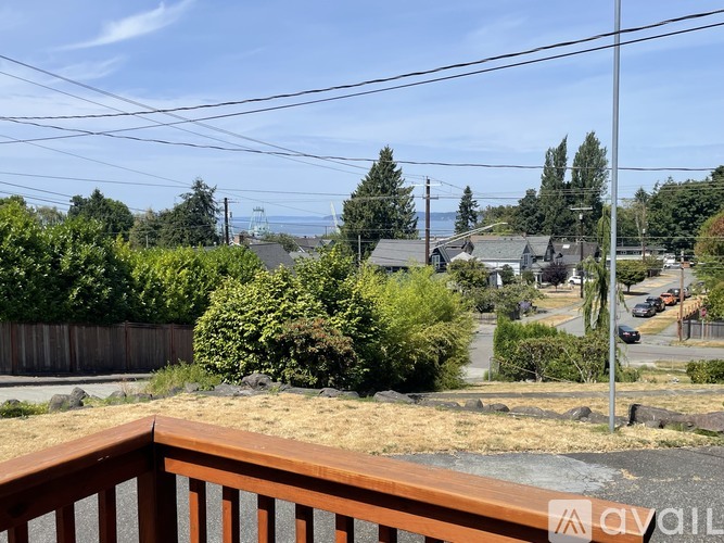A view from a balcony overlooking a residential area.