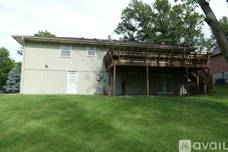 A house with a garage attached is for sale.
