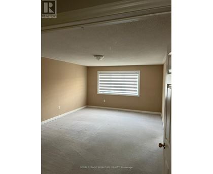 A room with a window and a door.