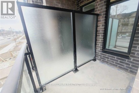 A glass door is installed on a balcony.