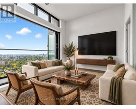 A modern living room with a view of the city.