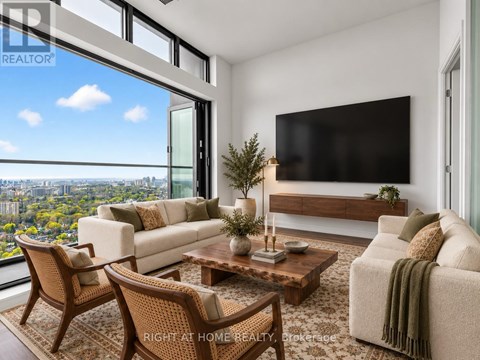A modern living room with a view of the city.