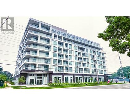 A large building with the words "2500 Clairson Rd East" on the front.