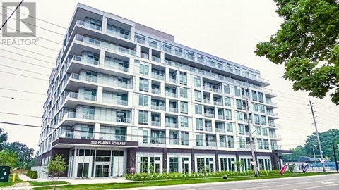 A large building with the words "2500 Clairson Rd East" on the front.