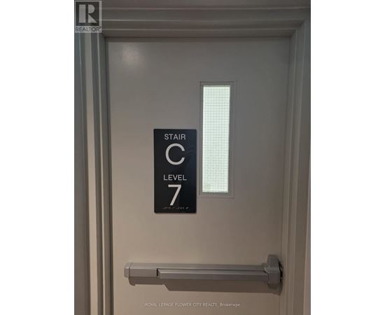 A sign on a door reads "STAIR C7 LEVEL 7".