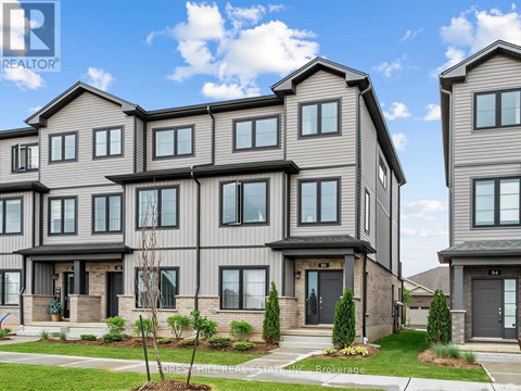 A row of houses with the word REALTOR on the top left corner.