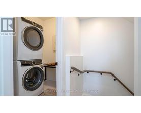 A washer and dryer in a small laundry room.
