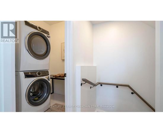 A washer and dryer in a small laundry room.