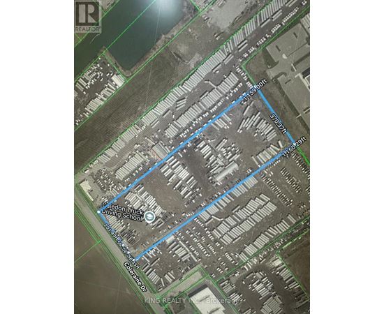 A satellite image shows a blue line running through a residential area.