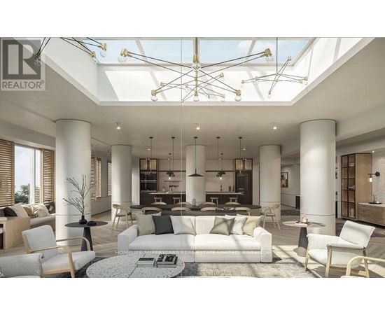 A modern living room with a glass ceiling and white furniture.
