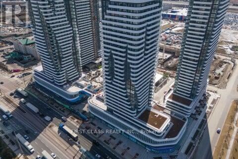 A First Class Realty building is seen from a high angle.