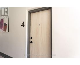 A door with a number 4 on the wall above it.