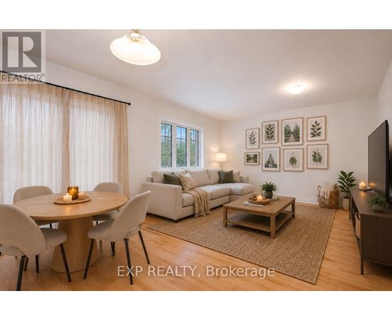 A well-lit living room with a dining table and chairs.