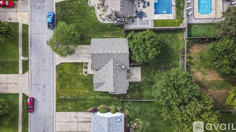 A house with a pool in the backyard.