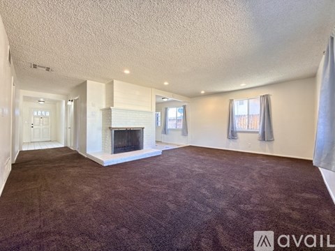 Source URL: https://prod-avail.s3.amazonaws.com/public_images/43121298/listing/Living_room_and_entrance_not_staged.jpeg