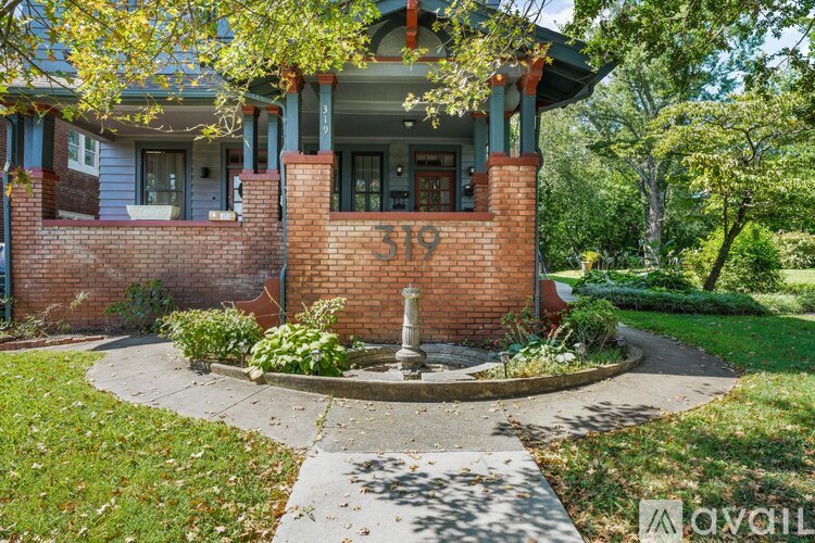 A house with the number 319 on it.