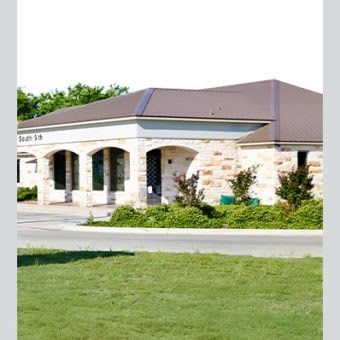 A building with a sign that says South 5th on it.