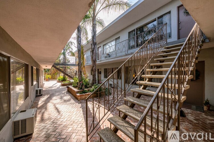 A house with a staircase leading to the second floor.