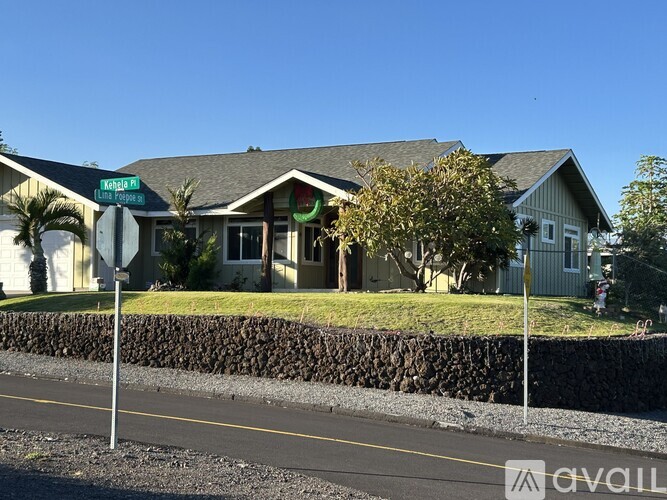 A house with a lawn in front of it is for sale.