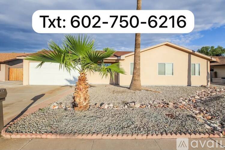 A house with a palm tree in front and a text box with the number 602-750-6216.