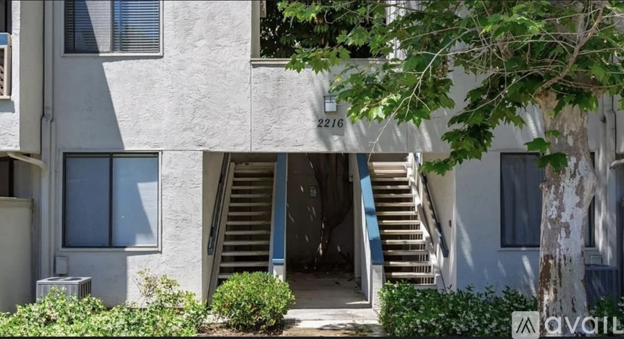 A white building with the number 2216 on it.