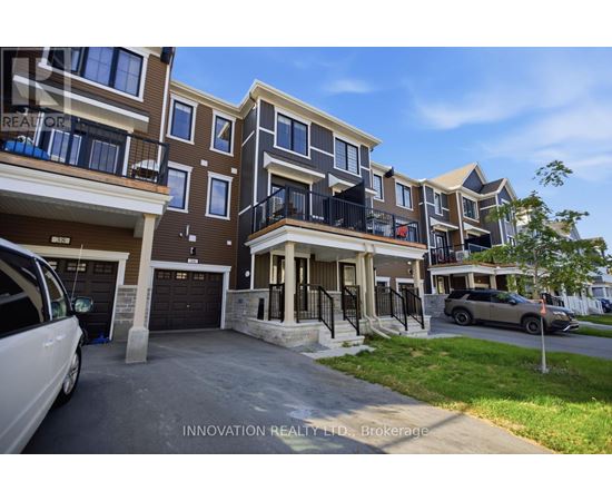A row of townhouses with balconies and garages are shown.