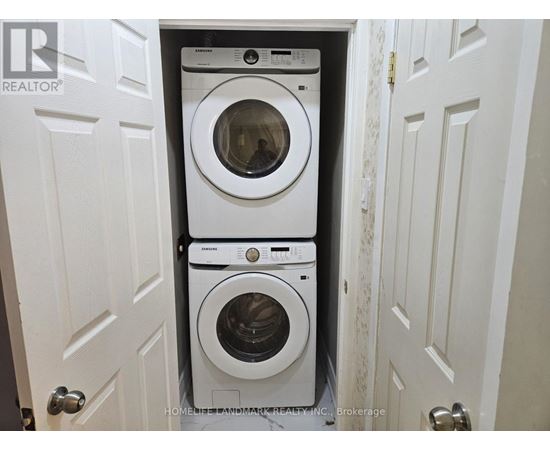 A white door with a Realtor logo on it.