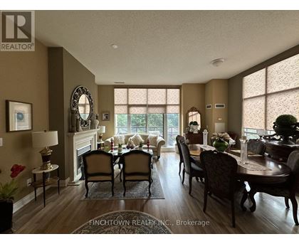 A dining room with a table set for six.