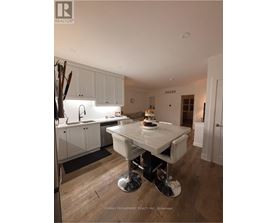 A modern kitchen with a dining table and chairs.